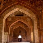 The interior view of a fort, showcasing the ancient arches and beautiful architecture.