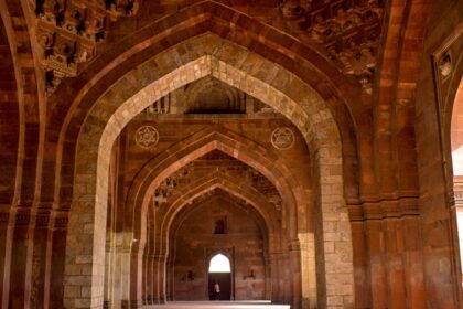 The interior view of a fort, showcasing the ancient arches and beautiful architecture.