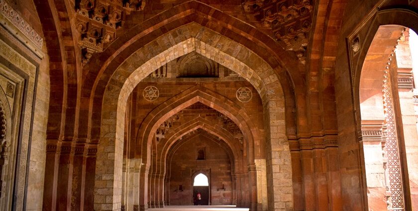 The interior view of a fort, showcasing the ancient arches and beautiful architecture.