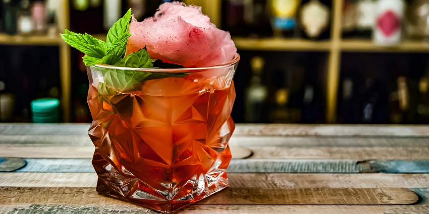 Relish cocktails at Ithaa Restaurant and Bar, one of the top spots for Maldives nightlife.