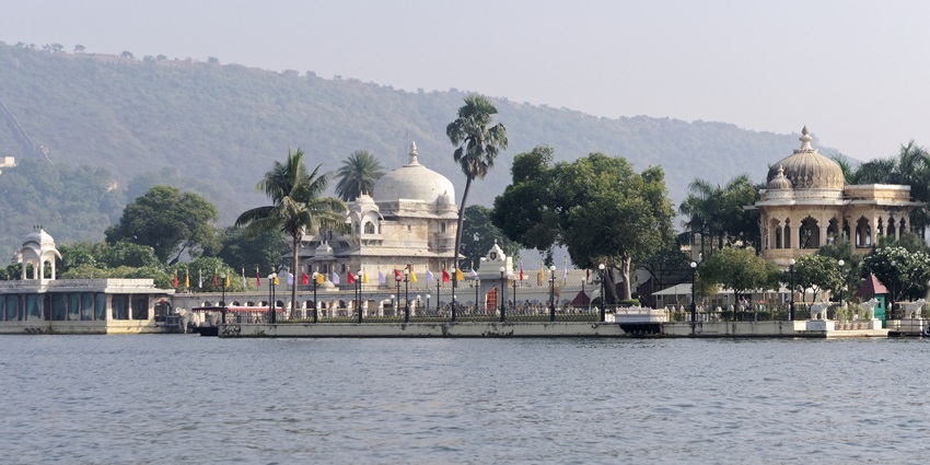 Jag Mandir palace on Lake Pichola in Udaipur, surrounded by serene waters.