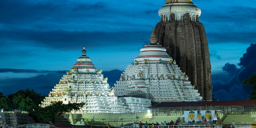 Night view of the Lord Jagannath Temple showcasing its architecture against the dark sky