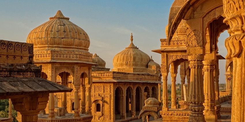 The picture taken in the golden hour of temple buildings similar to Jageshwari Mata Temple.