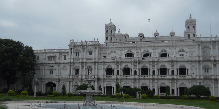Front view of the grand Jai Vilas Palace, showcasing its stunning European-inspired architecture.