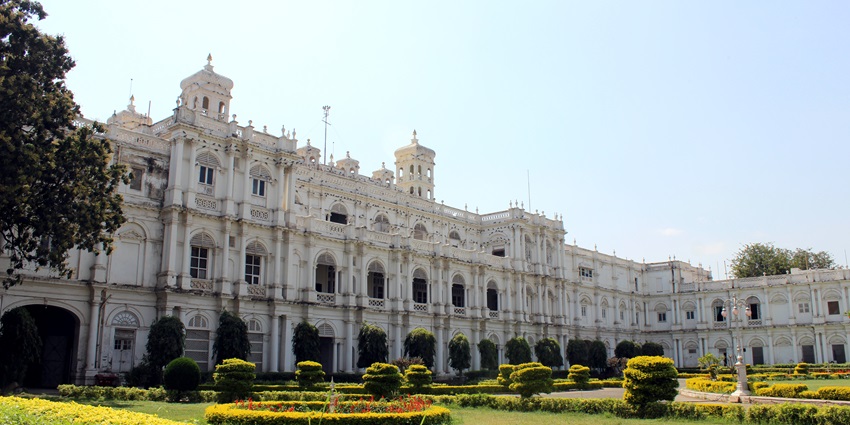 The landscape picture of the mesmerising Jai Vilas palace with fountain in front