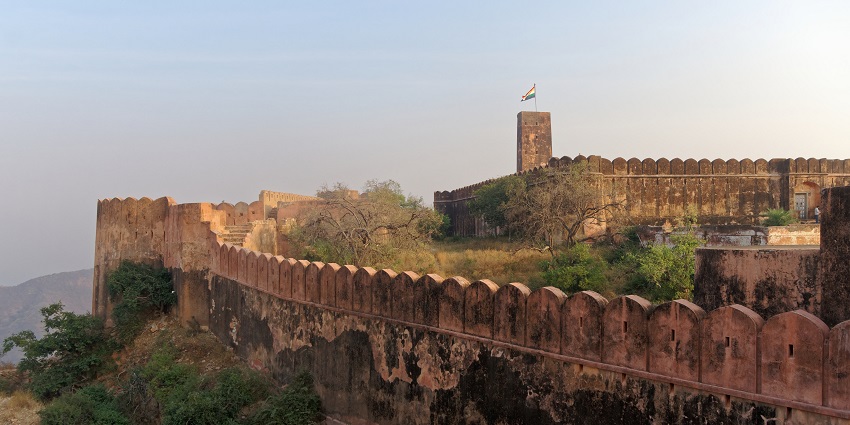 Interior view of Jaigarh Fort, showcasing a large, ornate hall with high ceilings