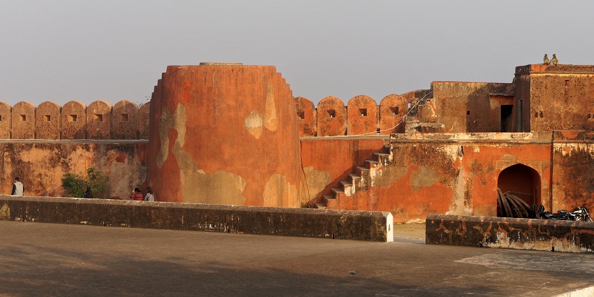 An image showcasing the ancient architecture and weathered walls of the famous Jaigarh Fort.
