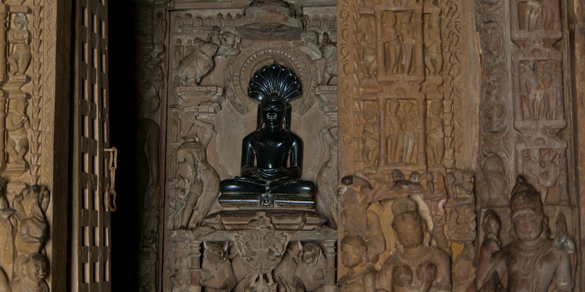 The landscape picture of the black stone statue in Parshwanath Jain Temple Khajuraho
