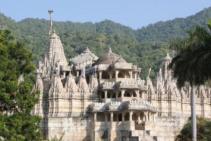 The Jain Temples in Gujarat are surrounded by lush greenery.