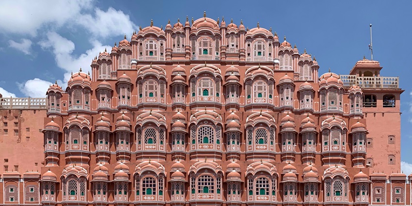 Jaipur's pink buildings and grand forts reflect its regal history.