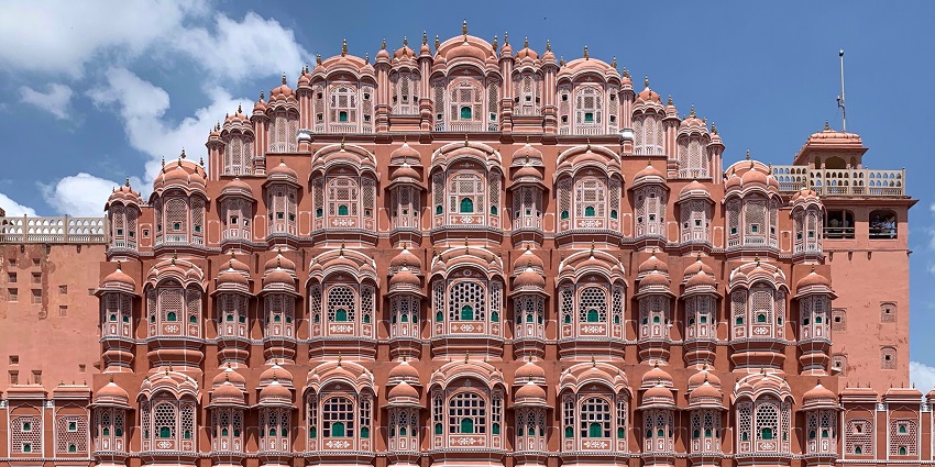 The iconic Hawa Mahal in Jaipur with the cityscape, one of the most attractive tourist places in Rajasthan.