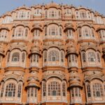 The image of a palace with a stunning exterior, one of the best places to visit in Jaipur.