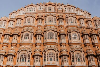 The image of a palace with a stunning exterior, one of the best places to visit in Jaipur.