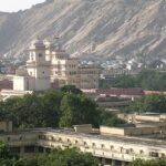 Panoramic view of Jaipur, displaying the city's skyline with historic and modern buildings.