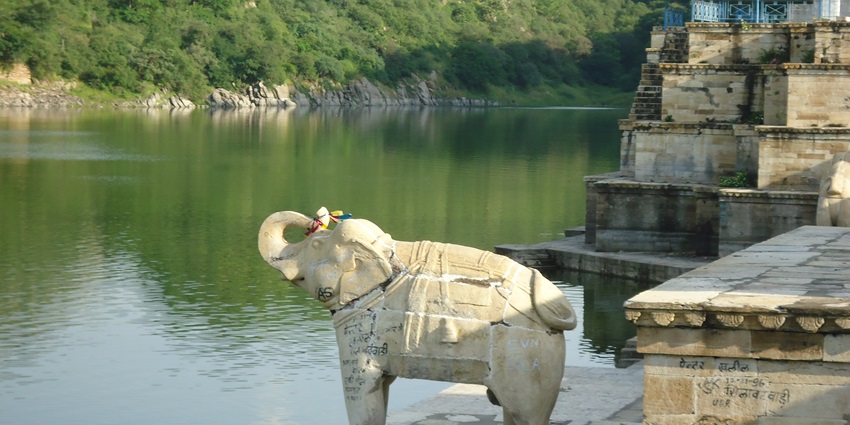 Scenic Jaisamand Lake near Alwar, a peaceful spot surrounded by nature and serene views.