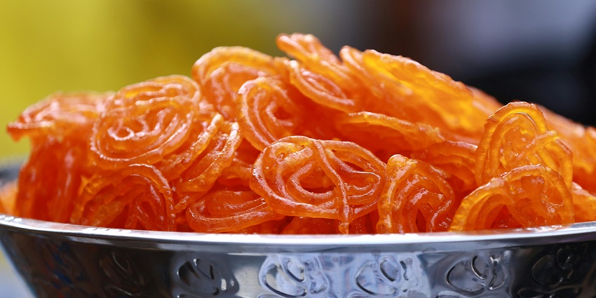 A tasty desert on the street is Jalebi that must be tried hot and fresh for a great experience.
