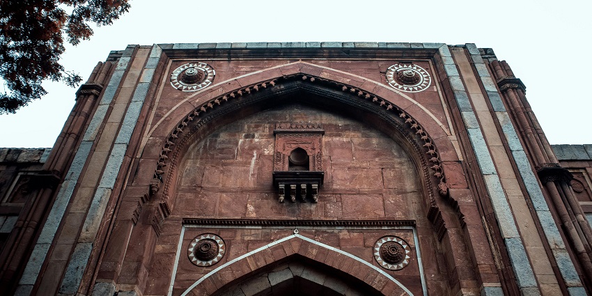 A serene front view of the renowned Jamali Kamali tourist attraction of the region.