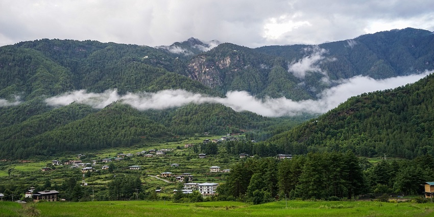 A scenic landscape of the village, capturing the natural beauty of the area near the monastery.