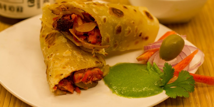 Chicken kathi roll served with mint chutney, a popular delicacy of the city enjoyed by non-veg lovers