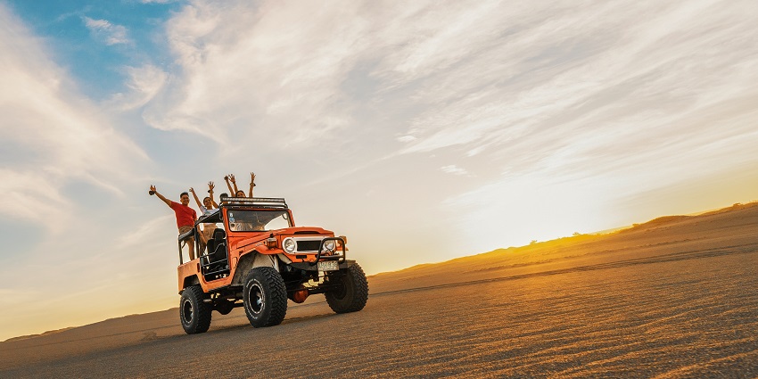 A thrilling jeep safari across rugged desert dunes, showcasing breathtaking landscapes.