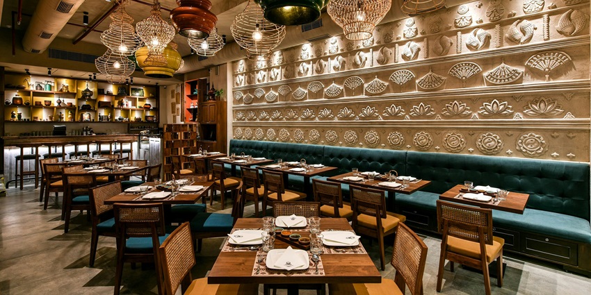 Jhumar Restaurant serves authentic Rajasthani cuisine in a warm atmosphere.