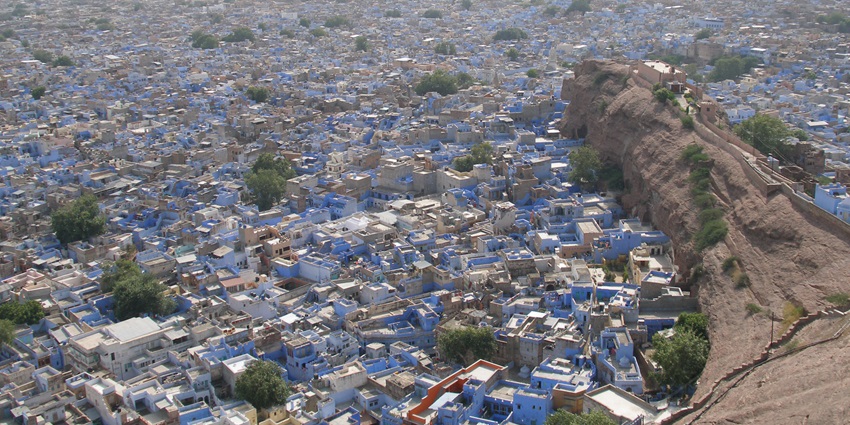 An image of Jodhpur's blue streets and majestic forts embody royal desert charm.