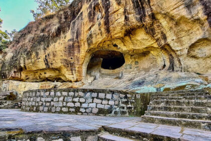 A panoramic view of Jogimara Caves with lush greenery in Chhattisgarh