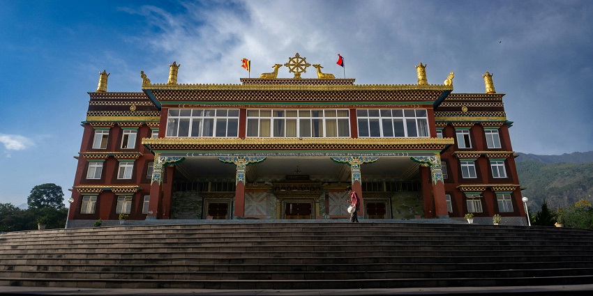 A breathtaking view of a Buddhist temple with stunning architecture during the day.