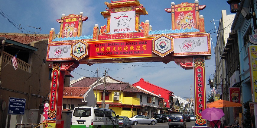 Bustling night market in Jonker Street, a popular place for shopping in Malaysia.