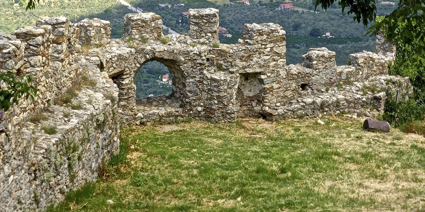 Beautiful image of the ruins of an ancient palace in the tree laden hills.