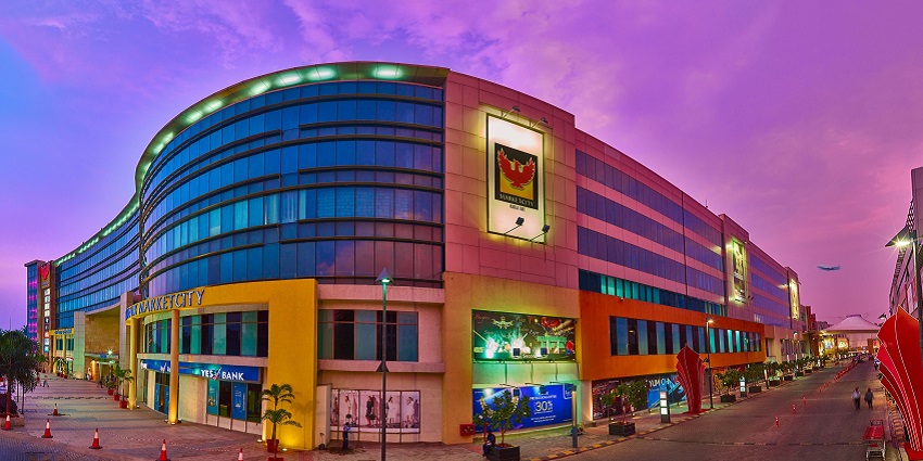 Interior view of K-Star Mall, showcasing shops and food court.