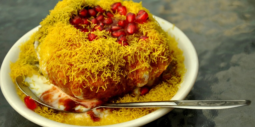 Raj Kachori served with chutney, curd and sprinkled with sev offers an explosion of flavours