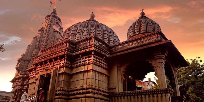 Kalaram Temple features a black stone idol and intricate carvings.