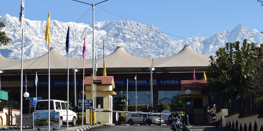 View of Kangra Airport to reach Himachal by air, featuring the road leading to the airport.