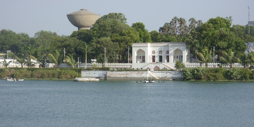 Kankaria Lake with Nagina Mahal at a distance on an island.