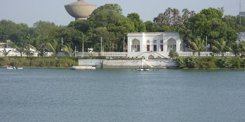 Kankaria Lake, surrounded by lush greenery, is a must-visit near Rasala Nature Park.