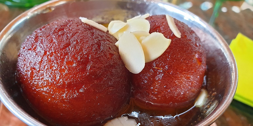 Gulab jamun served in a bowl, a perfect dessert for all sweet lovers served both hot and cold