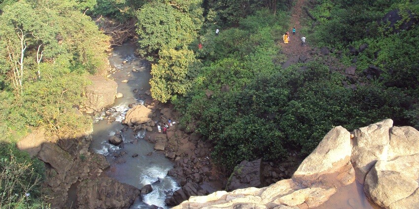 Kapildhara Waterfall, Amarkantak, cascading down rocky terrain, a beautiful tourist attraction near Amarkantak temple.