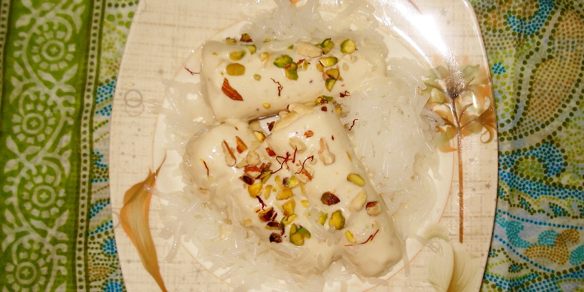 Punjabi Kulfi sprinkled with almonds and pistas, one of the favourite and refreshing sweet snacks