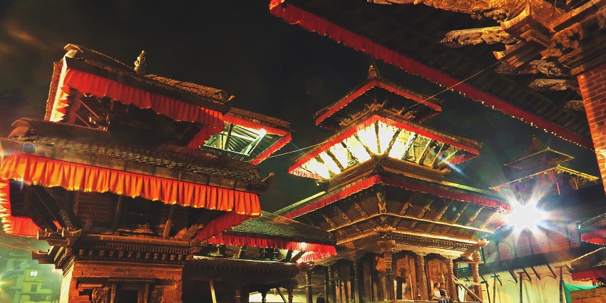 Tourist attraction near Swayambhunath Temple with traditional Nepali architecture and bustling atmosphere.