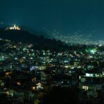 Night street view of Kathmandu with a lot of lit houses, bustling Kathmandu Nightlife.