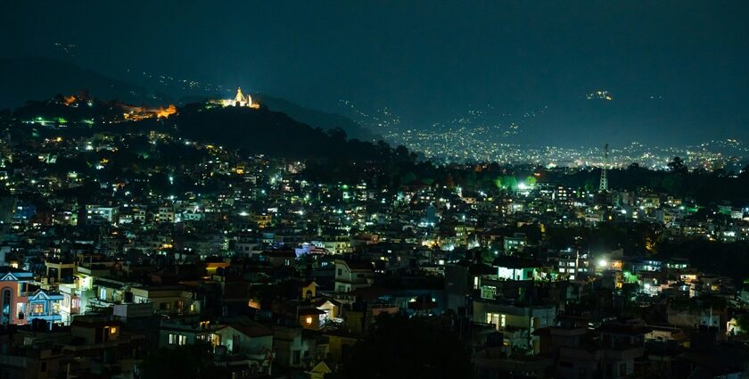 Night street view of Kathmandu with a lot of lit houses, bustling Kathmandu Nightlife.