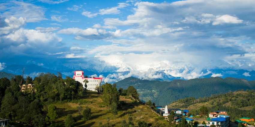 Panoramic view from Kausani, Uttarakhand, offering a stunning vista of snow-capped mountains