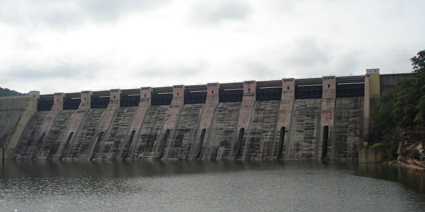 Scenic view of a dam with the serene reservoir in the front
