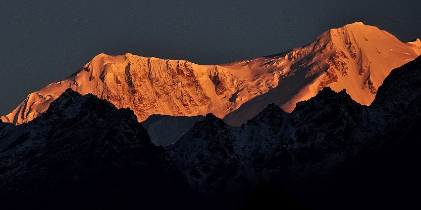Panoramic view of sunrise from the top of the himalayan mountain clearly visible from hilltop