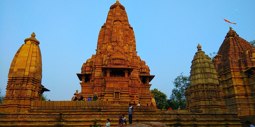 An intricate stone sculpture from the Khajuraho Group of Monuments, a tourist attraction near Nauradehi Wildlife Sanctuary.