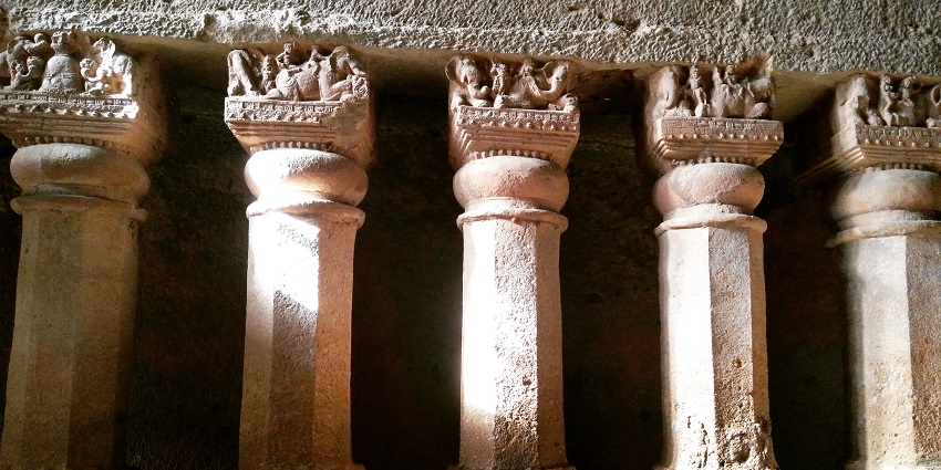 A picture of stone pillars at a famous Buddhist cave near the Analgadh Fort