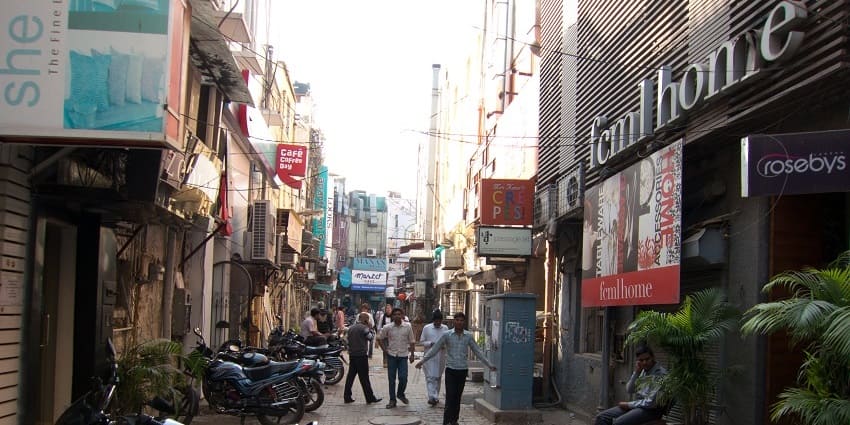 Khan Market as evolved into a hub for both locals and tourists for shopping.