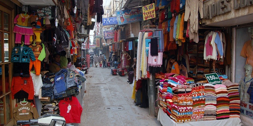Shop for unique souvenirs in Khan Market on your visit to the National Crafts Museum.