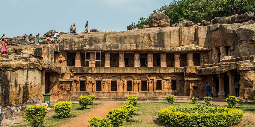 A picture of tourists exploring the Khandagiri and Udayagiri Caves, located in Odisha.